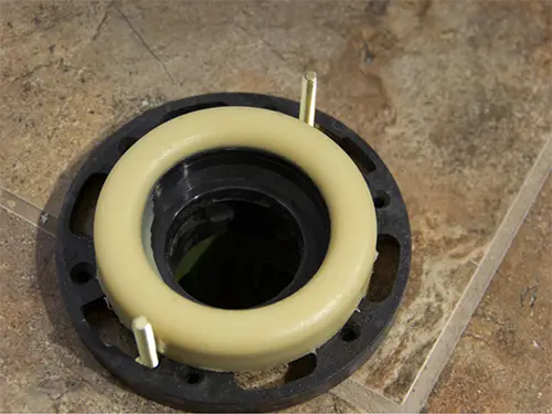 Closeup of a wax ring after it's installed and before a toilet is installed in a Niceville FL home
